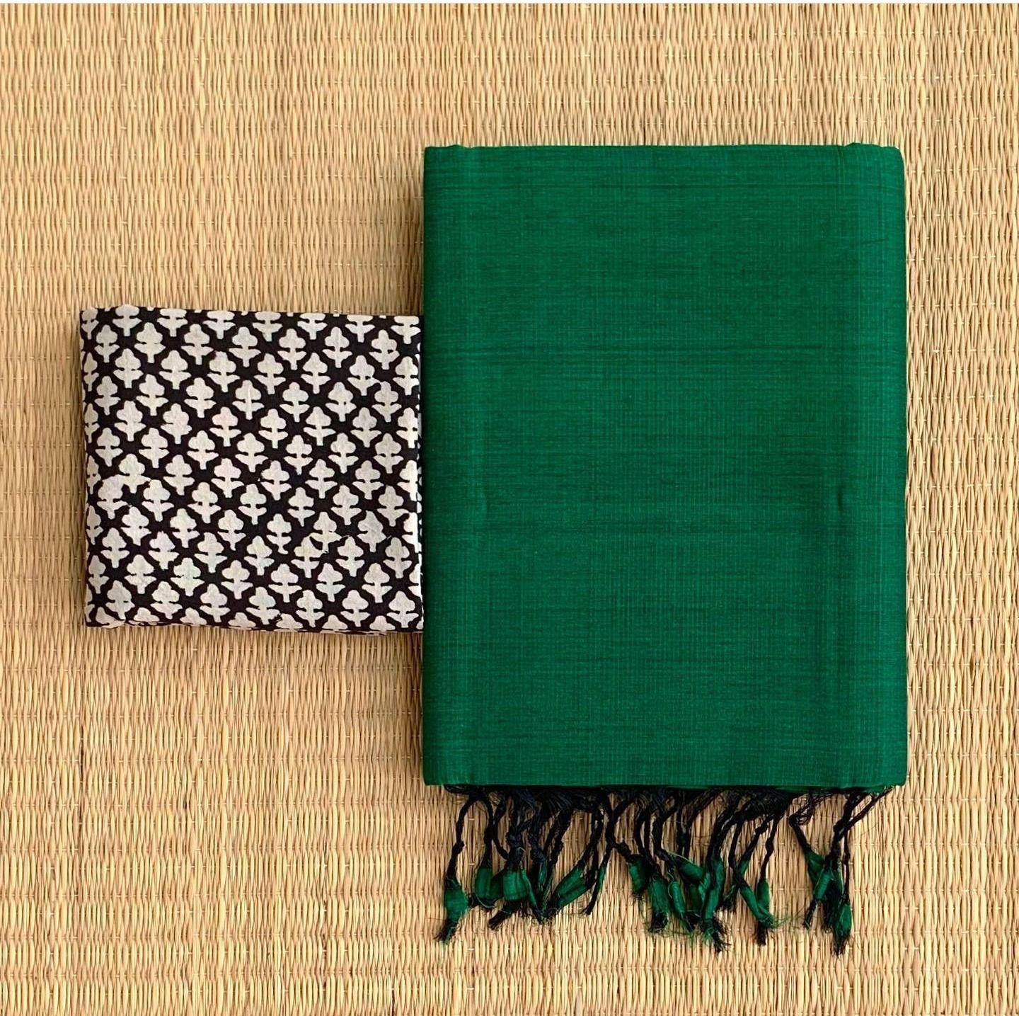 Solid Khadi cotton saree with contrast kalamkari/ajrak blouse piece