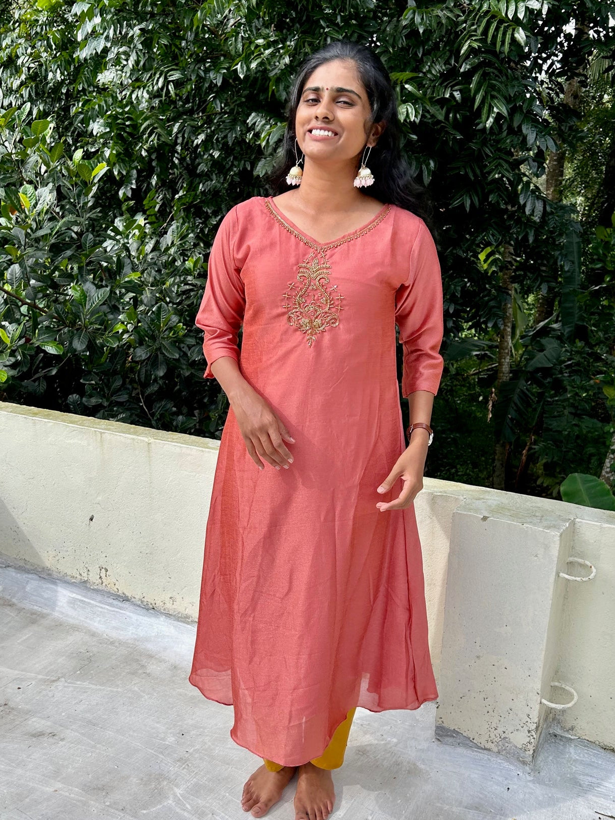 Peach embroidered Vichitra silk A-line kurti top(top only)
