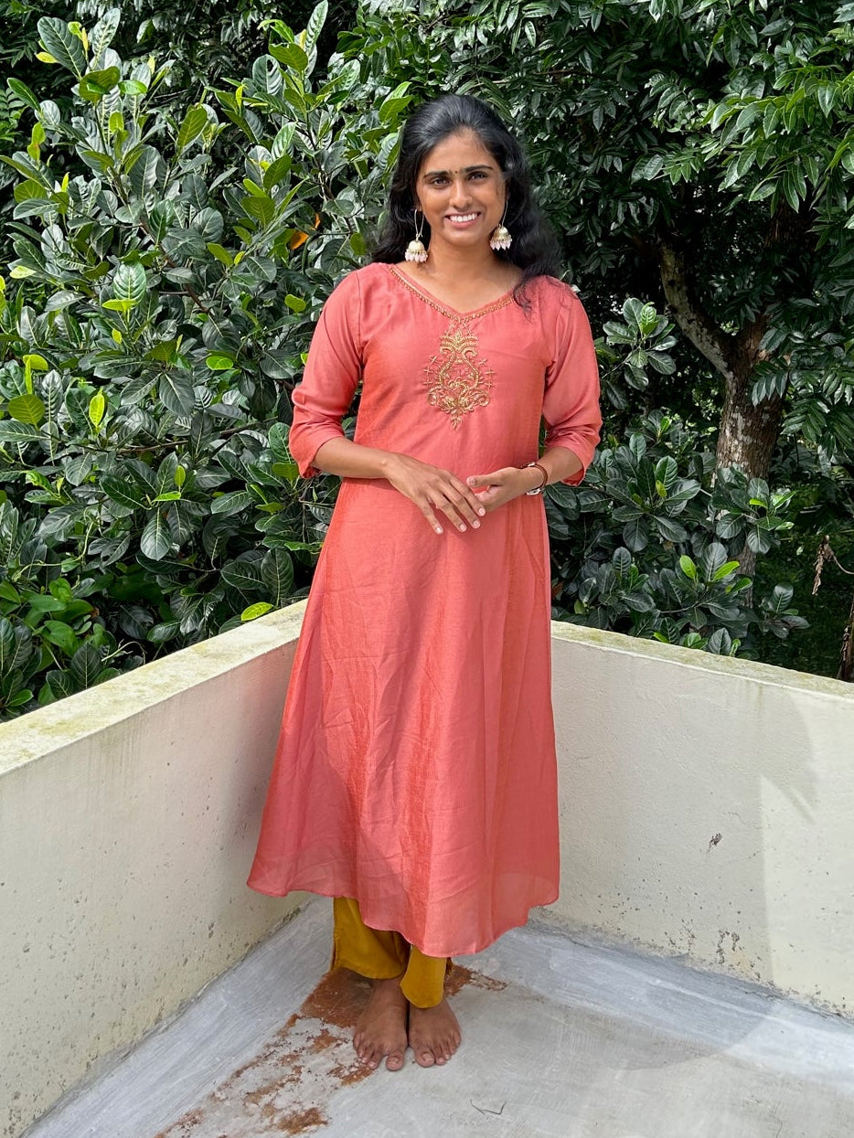 Peach embroidered Vichitra silk A-line kurti top(top only)