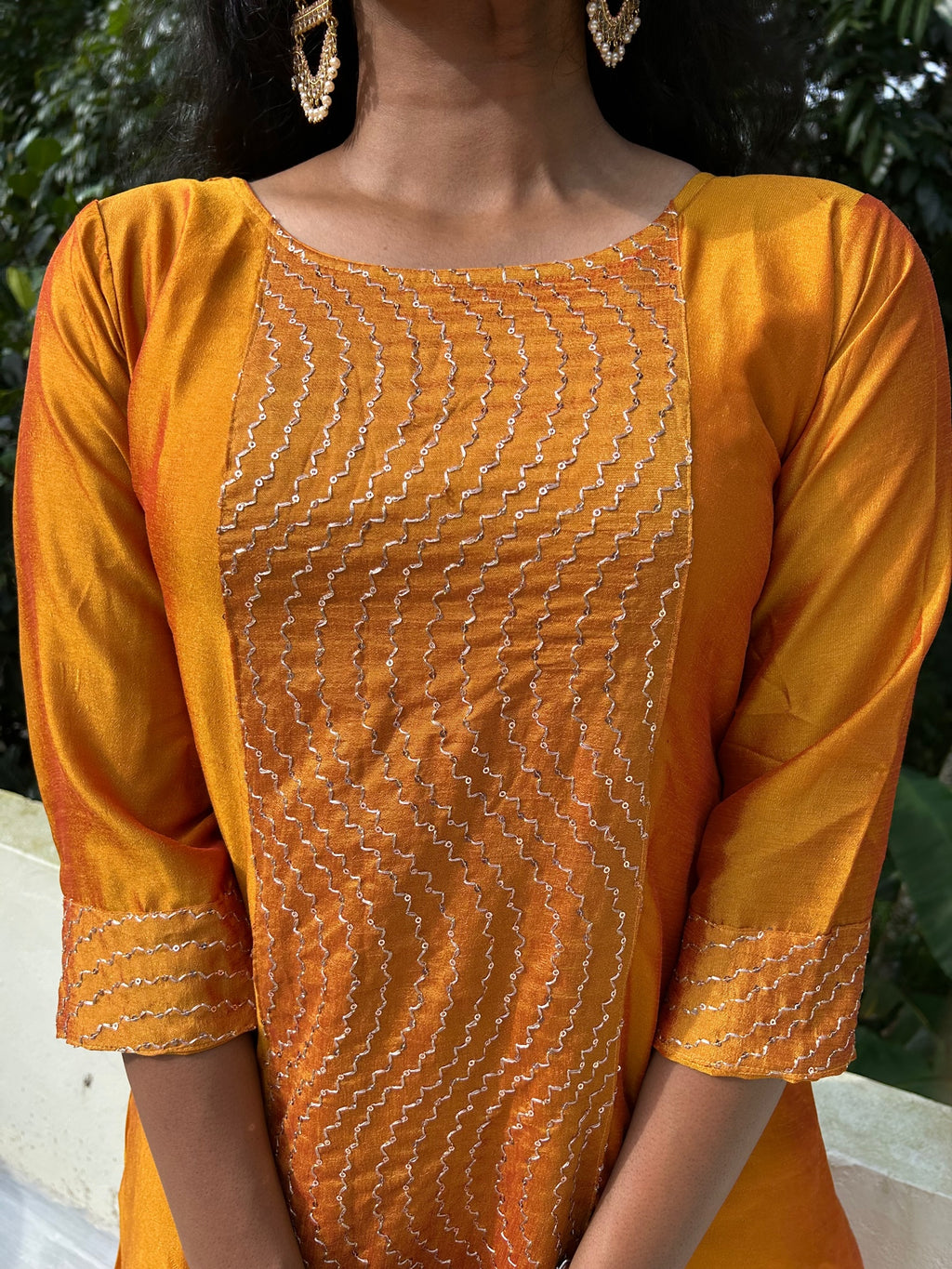 Mango yellow embroidered Vichitra silk A-line kurti top(top only)