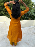 Mango yellow embroidered Vichitra silk A-line kurti top(top only)