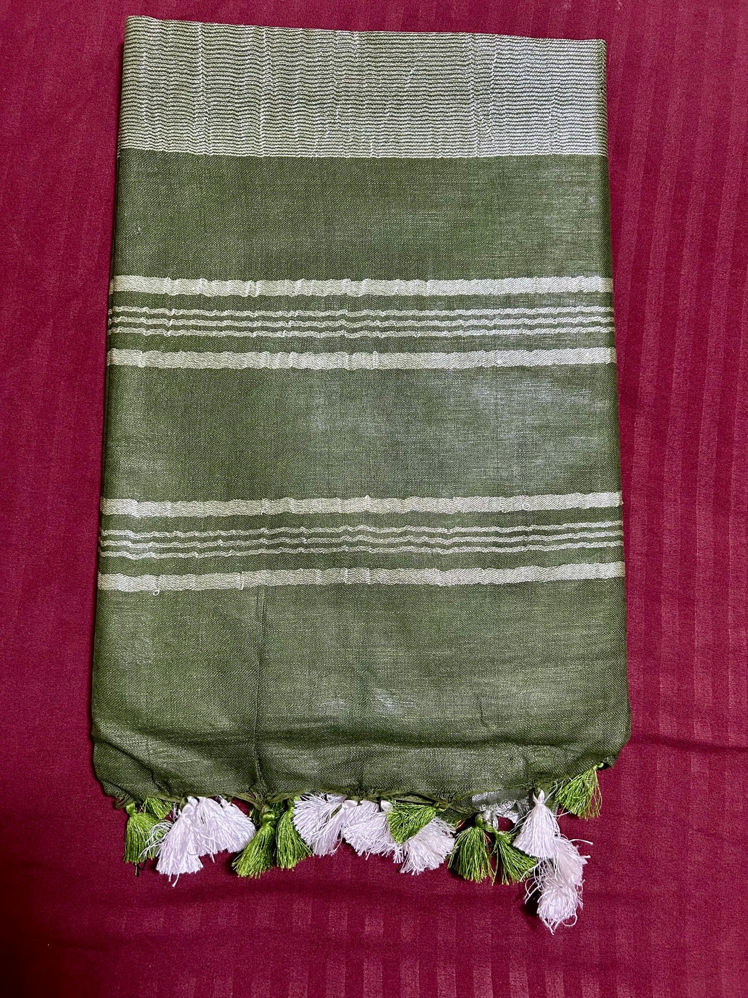 Mehandi Green Linen Saree With Silver Border & Green and white Tassels