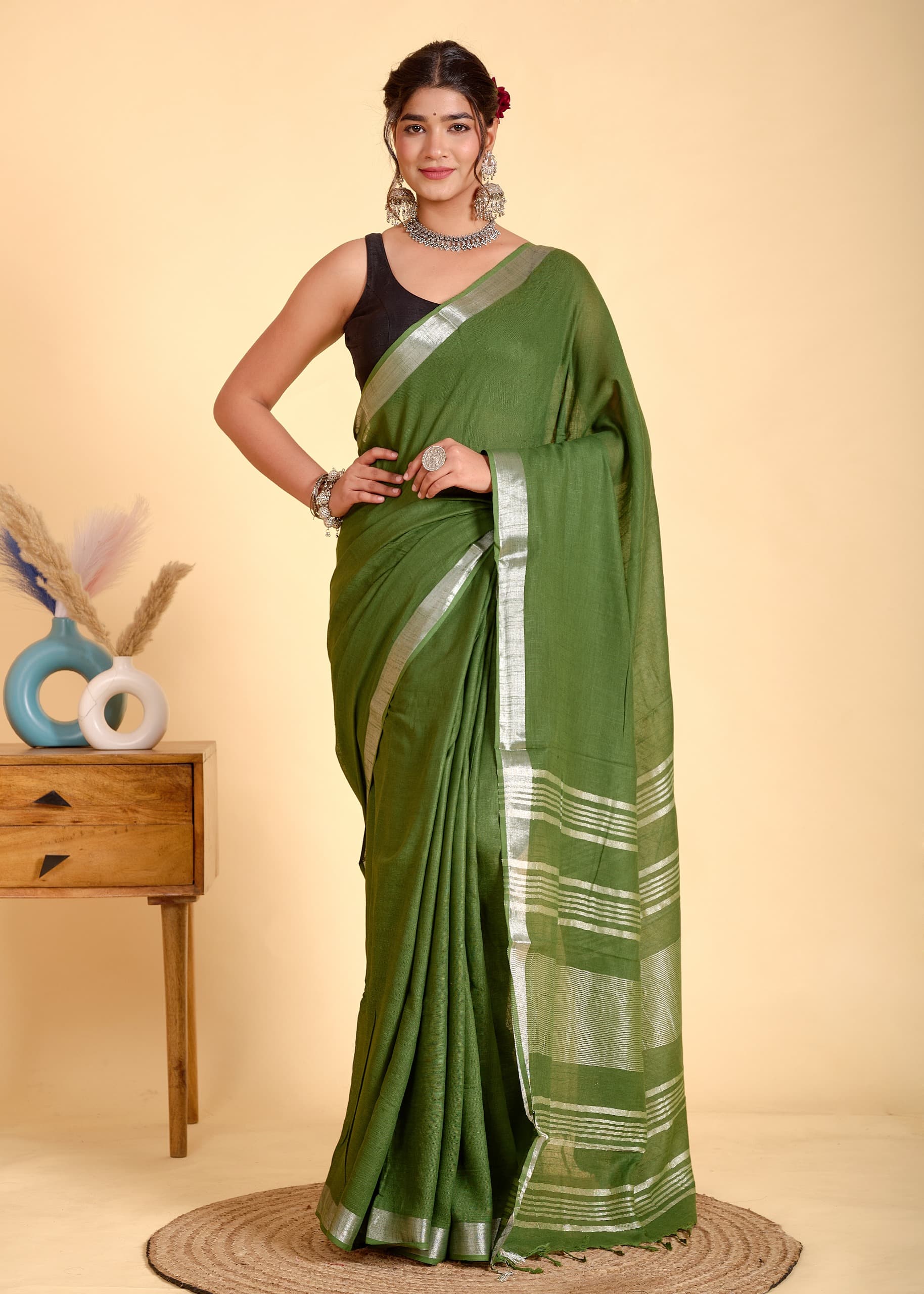 Mehandi Green Linen Saree With Silver Border & Green and white Tassels
