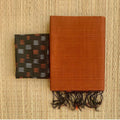 Solid Khadi cotton saree with contrast kalamkari/ajrak blouse piece