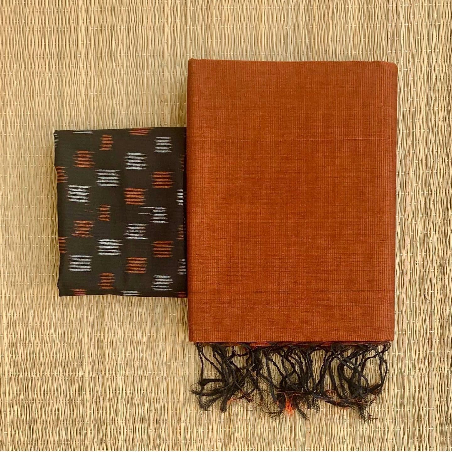 Solid Khadi cotton saree with contrast kalamkari/ajrak blouse piece